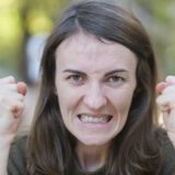 portrait of an angry woman complaining