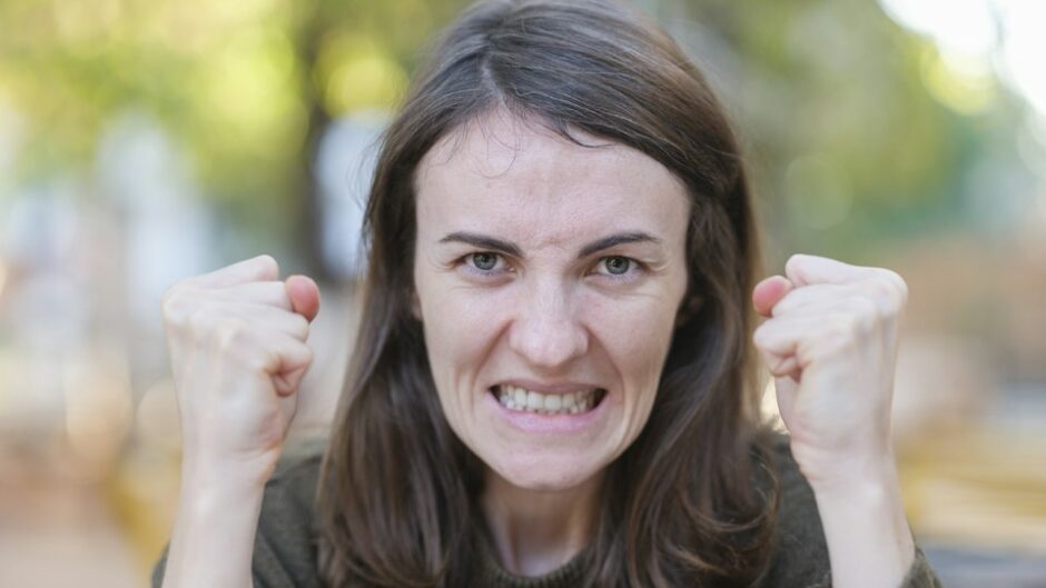portrait of an angry woman complaining